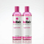 Two bottles of helixir sugar & shea elixir on a white background